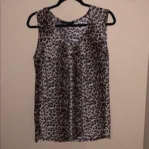 Leopard print sleeveless top.